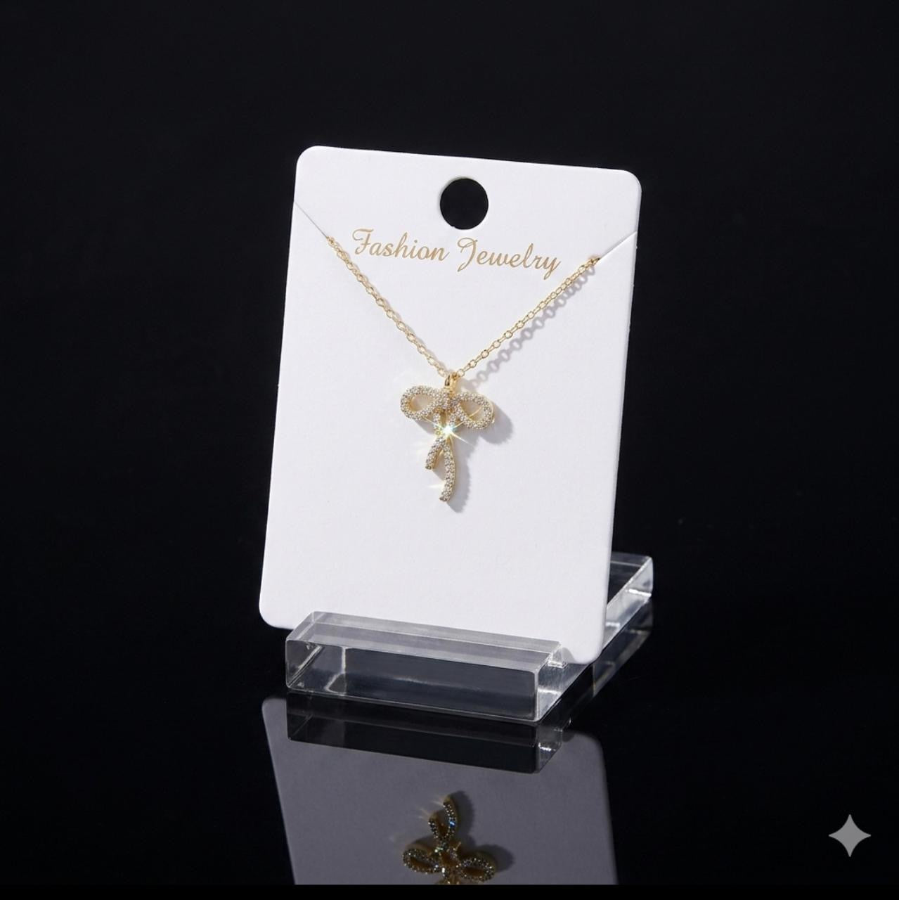 GOLD BOW TIE NECKLACE